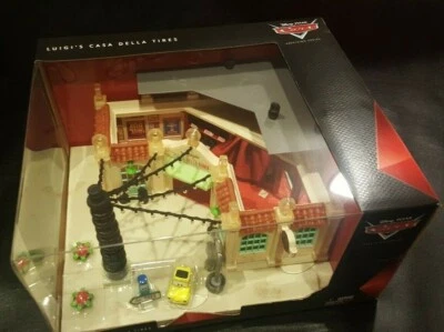 DISNEY PIXAR CARS PRECISION SERIES LUIGI'S CASA DELLA TIRES SAVE 6% GMC - Image 1 of 4