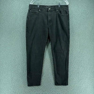 Pantalones de mezclilla Banana Republic Traveller para hombre 35x30 entrepierna medida 27 negros elásticos Foto 1 de 4