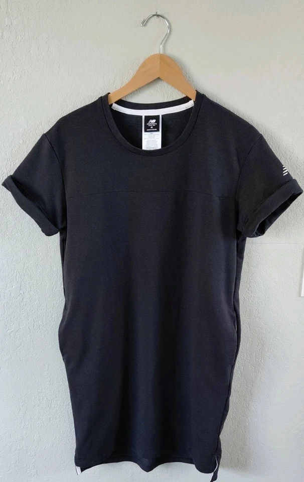 Camisa negra New Balance para mujer talla mediana vestido piquetes ocio ropa deportiva Foto 1 de 4