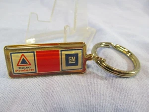 NEW GM DELCO PRODUCTS BUILDING ON 75 YEARS OF EXCELLENCE KEY RING KEYCHAIN - Bild 1 von 2
