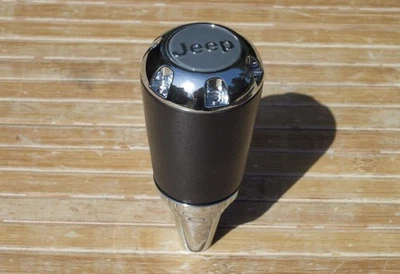 Perilla de cambio Jeep Commander '06-07 mango de palanca de cambios con emblema gris ¡OEM! Foto 1 de 3