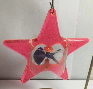 VINTAGE NEON PINK/ORANGE HARD PLASTIC STAR TWINKLER SPINNER CHRISTMAS ORNAMENT - Picture 1 of 7