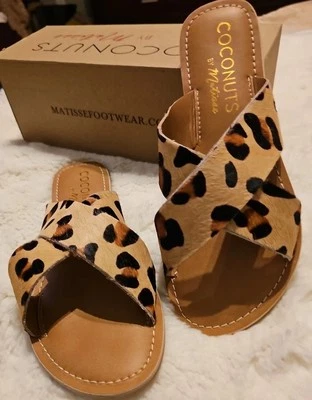 COCONUTS BY MATISSE SANDALS PEBBLE 7M FLAT LEOPARD COWHIDE SLIDES TAN BLACK-NWB - Image 1 of 4