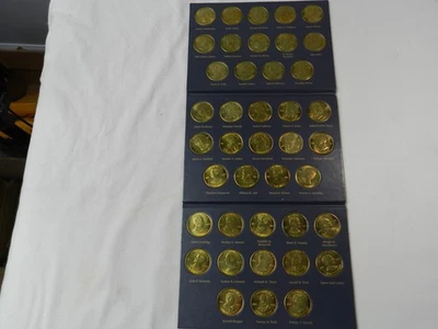 A  Coin History of the U.S. Presidents 41 Bronze Coins Album 1789 - 1993 - Image 1 of 4