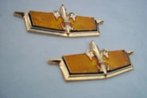 1970-1990 Caprice Classic conjunto de emblemas de cuarto de panel naranja - Imagen 1 de 5