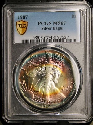 American Silver Eagle 1987 $1 - graduación profesional MS67 impresionante monstruo tonificación arco iris Foto 1 de 4