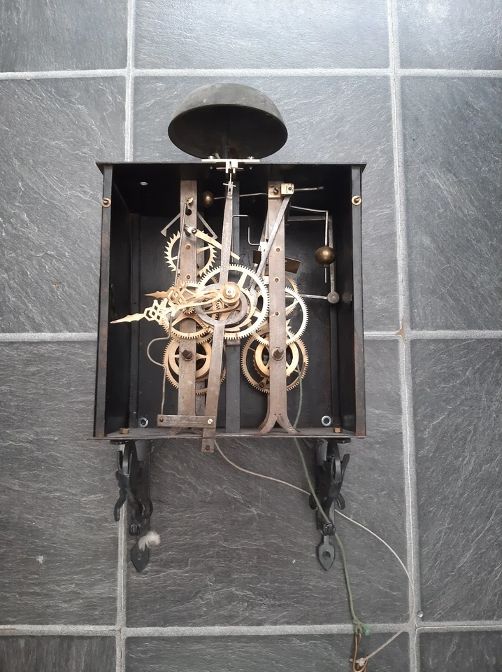 ANTIQUE WEIGHT DRIVEN COMTOISE MOVEMENT AND HANGING BRACKET - Image 1 of 4