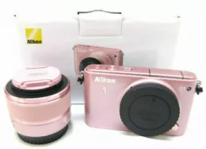 Nikon 1 S1 spiegelloses Digitalkameragehäuse m. 10-30mm Objektivset *pink*unberührt - Bild 1 von 6