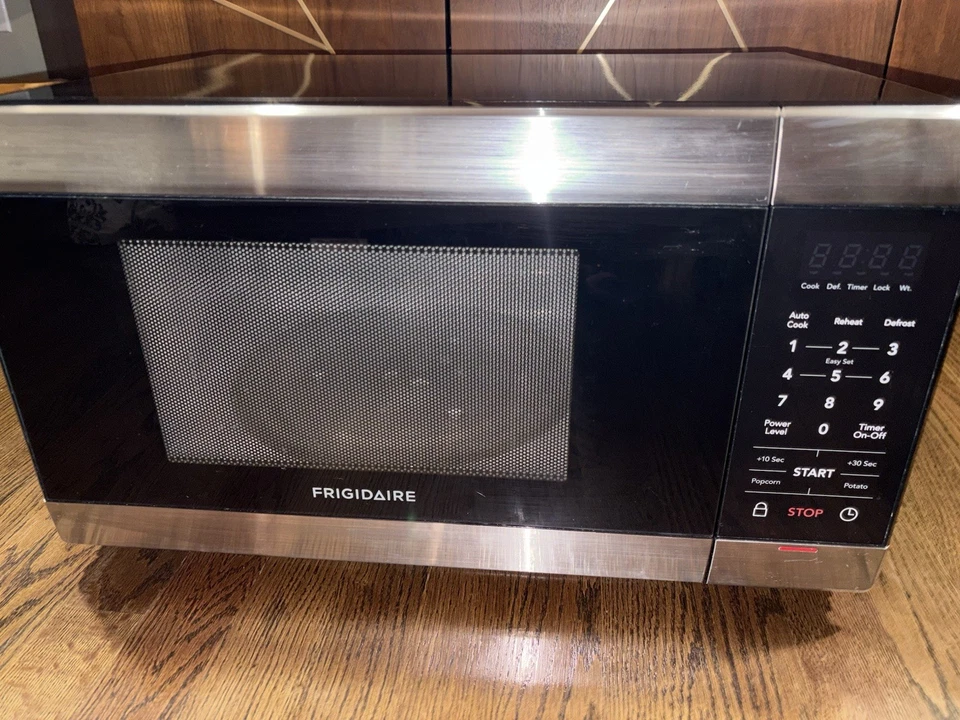 Frigidaire 1.1 Cu. ft Countertop Microwave Oven in Stainless Steel - Image 1 of 4