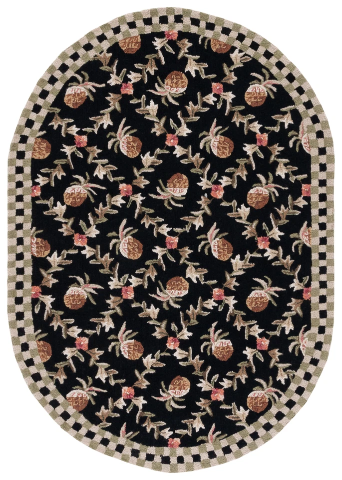 Safavieh Chelsea BLACK / IVORY 4'-6" X 6'-6" Oval Area Rug - HK164A-5OV - Image 1 of 3
