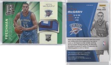 2014-15 Panini Spectra Freshman Fabrics Green Prizm /5 Mitch McGary Rookie RC