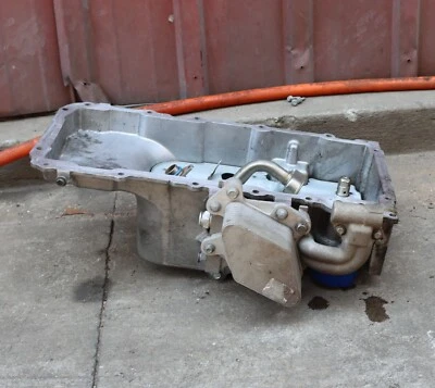 2010-2015 Chevrolet Camaro OEM LS3 6.2L Oil Pan W/ Oil Cooler USED GM - Image 1 of 4