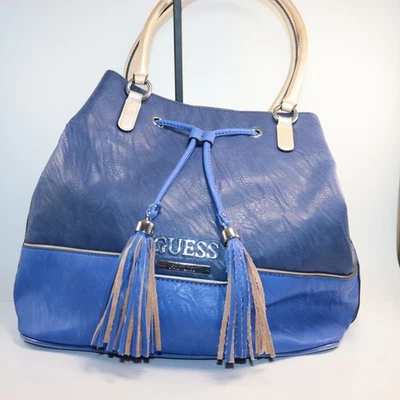 Guess PU drawstring bucket bag with tassels - Image 1 of 4
