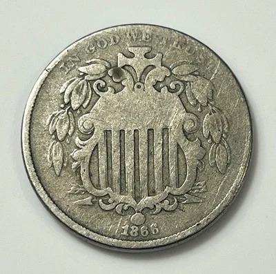 Escudo de níquel con rayos 1866 *SHLDNICK702 Foto 1 de 4