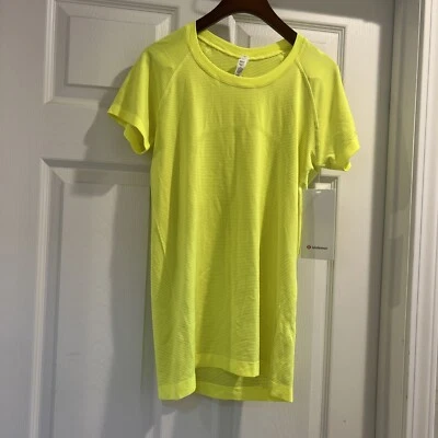 Novo com etiquetas Lululemon Swiftly Tech manga curta 2.0 destaque amarelo HIYE tamanho: 6&8 - Imagem 1 de 4
