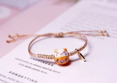 Lindo brazalete de mano cuerda encerada ajustable con cuentas de gato de la suerte de cerámica de 14 mm para niñas/mujeres 4-9" Foto 1 de 4