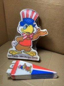 100x Los Angeles 1984 Olympics Sam Eagle Die Cut + 100x Small Flag Pennant - NEW - Picture 1 of 20