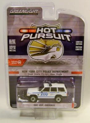1997 '97 JEEP CHEROKEE NEW YORK POLICE COP CAR HOT PURSUIT 38 GREENLIGHT 2021 - Image 1 of 2