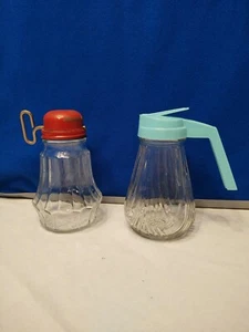 Vintage Red Metal Top Nutcracker And Maple Syrup Glass Containers - Picture 1 of 10