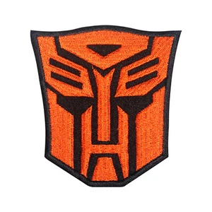 Transformer Orange Face Logo Patch Iron on Sew on Embroidered Patch For Shirts - Picture 1 of 1