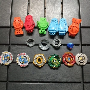 Beyblade Konvolut Spinner Teile Pieces Tops Bey Blade 16 Stück Hasbro Tomy - ZC - Bild 1 von 7