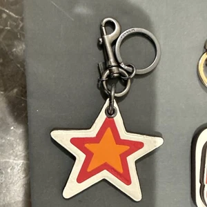 NWOT COACH BAG TAG STAR BRASS CHARM KEY CHAIN SIGNATURE PLATE - Picture 1 of 3