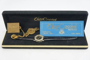 Vintage Oleg Cassini Ladies Everday Quartz Watch Round Silver Tone Black Leather - Bild 1 von 4