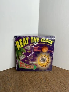 Beat the Clock Book and Stopwatch Game 100 Challenging Questions Vintage 1998 - Picture 1 of 4