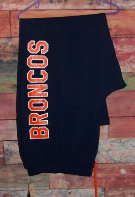 NUEVO CON ETIQUETAS - Cacique (ropa del equipo de la NFL) - Pantalones de salón / dormir - 26 / 28 - Azul / Naranja Foto 1 de 4