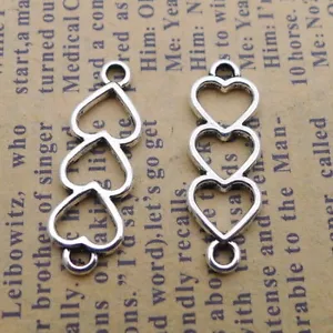 20 piezas Creativo Conector Corazones Huecos Colgante Plata Hágalo usted mismo Accesorios 8x24 mm - Imagen 1 de 2