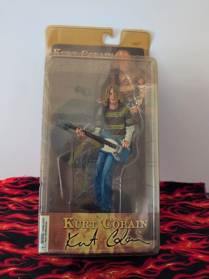 Figura de acción NECA Kurt Cobain 7"" con guitarra Skyblue (2006) sellada Foto 1 de 4