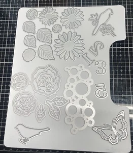 LOT OF CUTTING DIES FLOWERS BIRDS NUMBERS BUTTERFLIES WHITE PAGE NOT INCLUDED - Picture 1 of 5