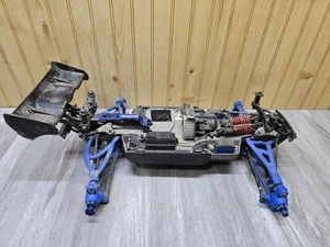 *RARE* TRAXXAS E-REVO 1.0 BRUSHLESS EDITION 1/8 MONSTER TRUCK ROLLER SLIDER CHAS - Picture 1 of 11