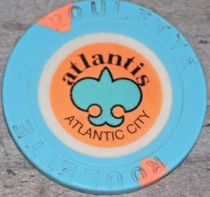 VINTAGE 1ST EDT ROULETTE CHIP(BW) FROM THE ATLANTIS CASINO ATLANTIC CITY - Picture 1 of 2