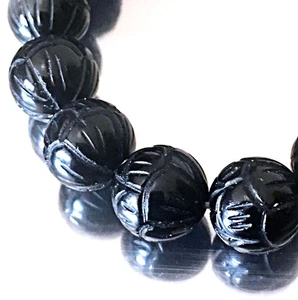 Cuentas redondas de flor de loto talladas en ónix negro de 10 mm (12 piezas) - Imagen 1 de 2