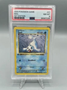 Tarjeta Pokemon: 1ª Edición SEEL 1999 BASE PSA 8 CASI NUEVA-COMO NUEVA - Imagen 1 de 2