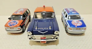 1:43 SCALE 1957 CHEVROLET POLICE CAR NASSAU COUNTY + NY METS & NY YANKEES YUKON - Picture 1 of 15