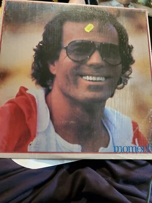 JULIO IGLESIAS, Momenti . Plastic on sleeve but opened.  Record is in very nice  - Image 1 of 4