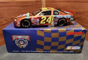 NUOVO CON SCATOLA JEFF GORDON #24 CHROMALUSION 1998 MONTE CARLO 1:24 AZIONE PRESSOFUSO - Foto 1 di 17