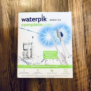 Nuevo cepillo de dientes eléctrico sónico Waterpik Complete Care 9.0 y hilo dental de agua CC-01 - Imagen 1 de 4