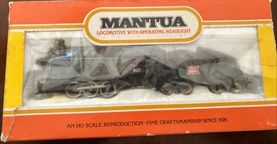 VINTAGE MANTUA HO ROCK ISLAND LOCOMOTIVE  With HEADLIGHT 407 IN BOX - Image 1 of 4