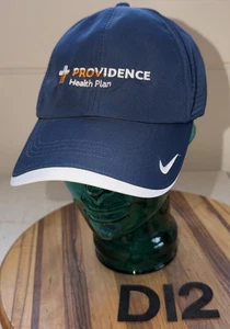 NEU OHNE ETIKETT PROVIDENCE HEALTH PLAN MARINEBLAU DRI-FIT STRAPBACK VERSTELLBARE MÜTZE NIE GETRAGEN D12 - Bild 1 von 3