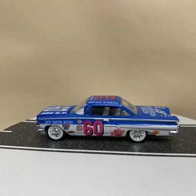 Хардтоп Chevy Impala 1960 Racing Champions 50th Anniversary Brian O'Neal 1:64 почти как новый - Изображение 1 из 4