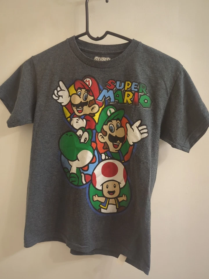 CAMISETA NINTENDO SUPER MARIO BROS TAMANHO L 10-12 RARA!! jovens - Imagem 1 de 4