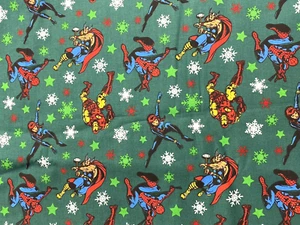 Tela de algodón camelot Marvel Heros Navidad 3 yardas verde - Imagen 1 de 4