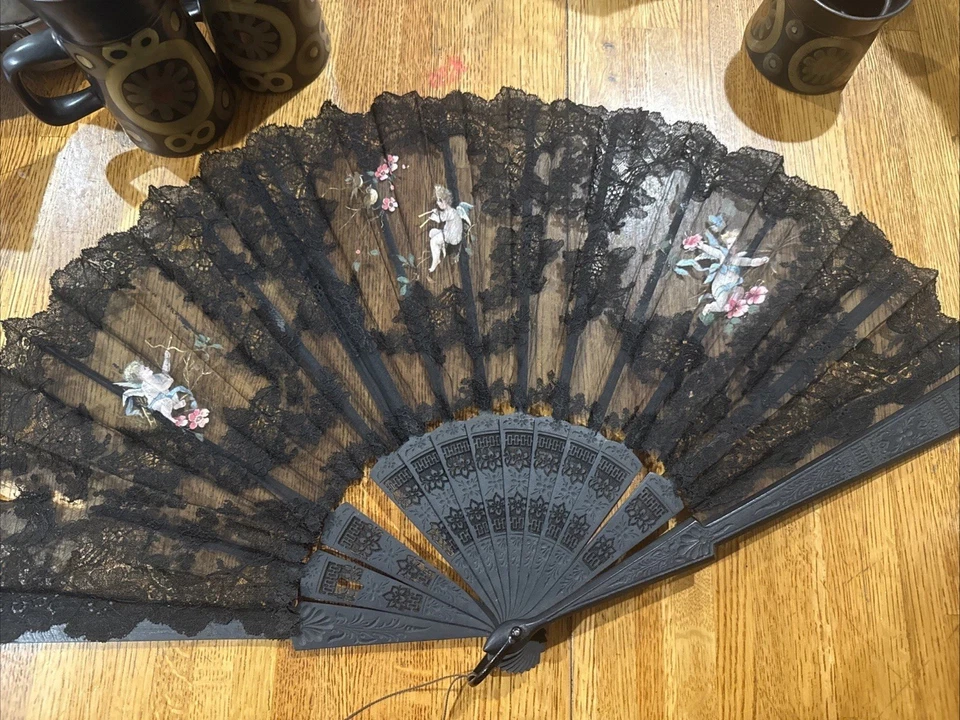 Antique carved wood black Hand Fan Black Lace painted angel cherubs needs repair - Image 1 of 4