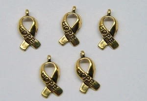 25 Tibetan Antique GOLD Cancer Awareness Ribbon Charms HOPE Lead + Nickel Free - Picture 1 of 4