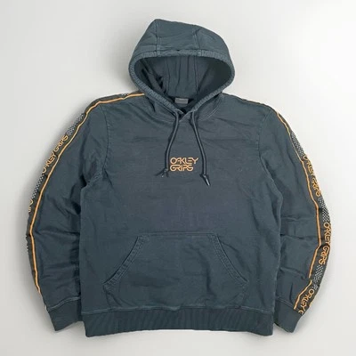 Sudadera con Capucha Oakley Grips Naranja Negro Ajuste Personalizado Manga Grande Rayas Foto 1 de 4