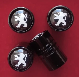 LOT 4 BOUCHON DE VALVE NOIR LOGO LION PEUGEOT - ENVOI DE FRANCE EN SUIVI - Picture 1 of 2