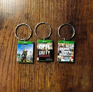 Gamers Game Keyrings ANY GAME You Want - GTA V Call of Duty Halo & More - Foto 1 di 12